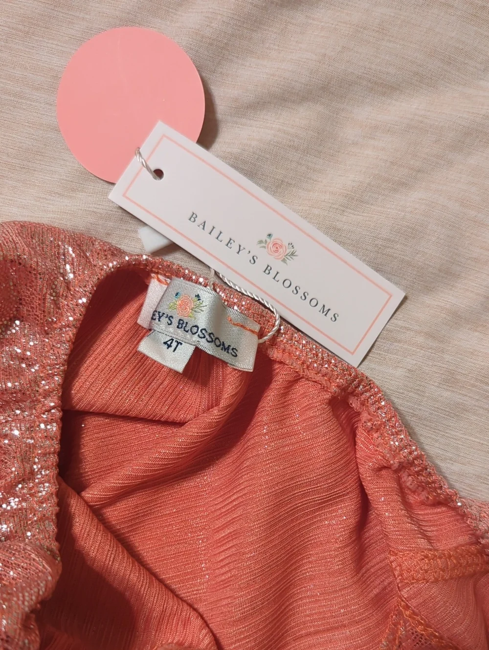 Shimmery Pink Girls' One-Piece Bodysuit by (no brand visible)